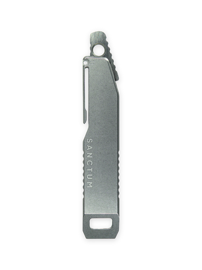Titanium pry bar as a sheath for a compact pocket fixed blade
