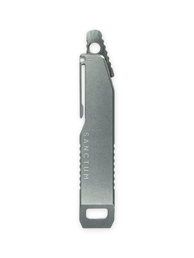 Titanium pry bar as a sheath for a compact pocket fixed blade Hover Image
